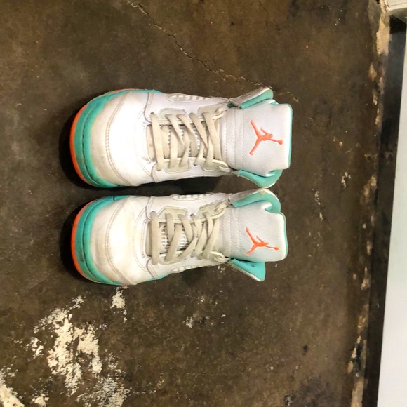 blue and white jordans with orange laces